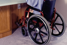 Photo of a manual wheelchair being sat in
